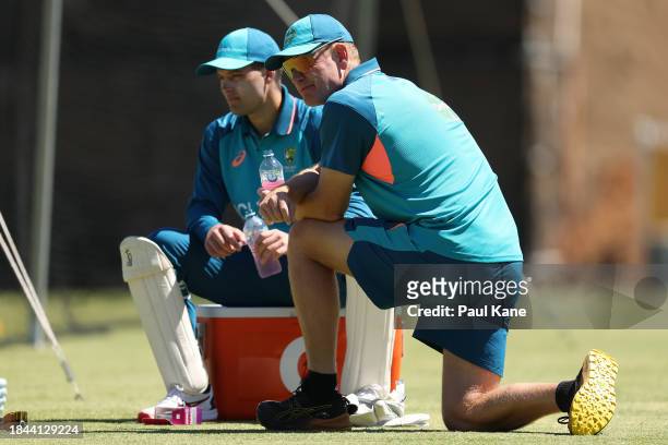 Andrew McDonald, head coach of Australia looks on with Alex Carey during an Australian nets session the at the WACA on December 10, 2023 in Perth,...