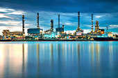 Oil refinery with reflection, petrochemical plant