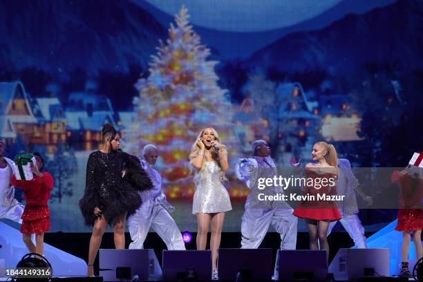 Jennifer Hudson, Mariah Carey, and Ariana Grande perform during Mariah Carey's "Merry Christmas One And All!" at Madison Square Garden on December...