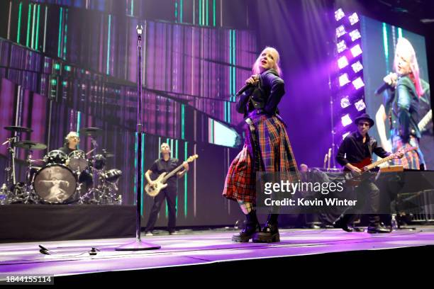 Butch Vig, Shirley Manson and Duke Erikson of Garbage perform onstage during Audacy's KROQ Almost Acoustic Christmas 2023 at The Kia Forum on...