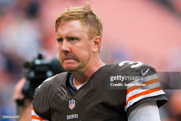 Quarterback Brandon Weeden of the Cleveland Browns reacts after the game against the Detroit Lions at FirstEnergy Stadium on October 13, 2013 in...