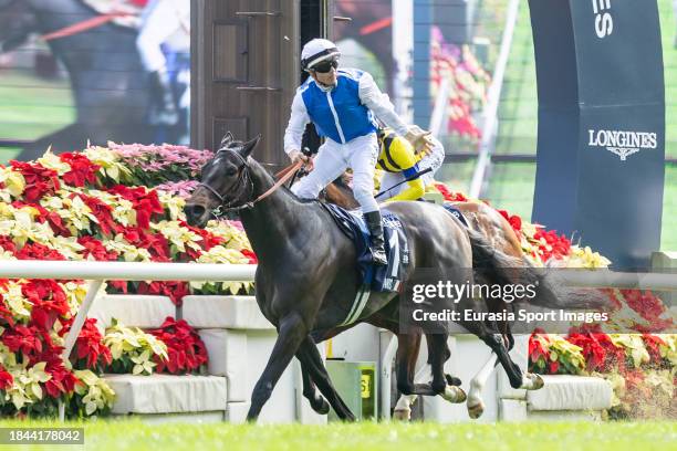 Jockey Maxime Guyon riding Junko wins the LONGINES Hong Kong Vase of the LONGINES Hong Kong International Races at Sha Tin Racecourse on December 10,...