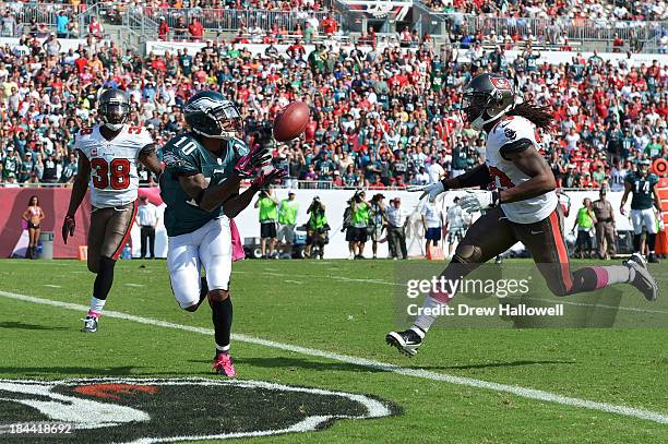 DeSean Jackson of the Philadelphia Eagles catches a pass for a touchdown between Dashon Goldson and Mark Barron of the Tampa Bay Buccaneers at...