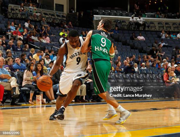 Tony Allen of the Memphis Grizzlies drives to the basket against Moran Roth of the Maccabi Haifa during a preseason game on October 13, 2013 at...