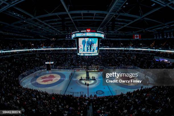 General view of the arena bowl during the ceremonial puck drop between the Winnipeg Jets and the Carolina Hurricanes on Canadian Armed Forces...