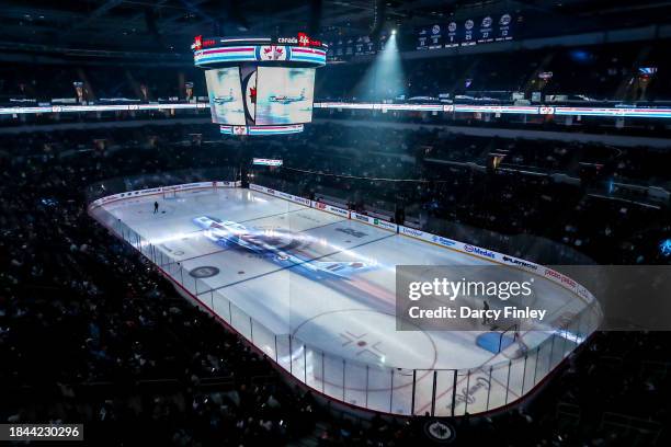 General view of the arena bowl on-ice projections prior to NHL action between the Winnipeg Jets and the Carolina Hurricanes on Canadian Armed Forces...