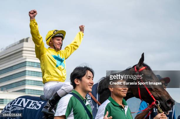 Jockey Zac Purton riding Lucky Sweynesse celebrates winning the LONGINES Hong Kong Sprint of the LONGINES Hong Kong International Races at Sha Tin...