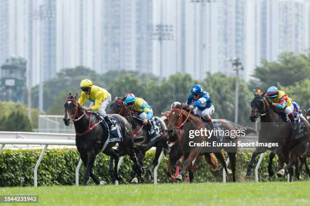 Jockey Zac Purton riding Lucky Sweynesse wins the LONGINES Hong Kong Sprint of the LONGINES Hong Kong International Races at Sha Tin Racecourse on...