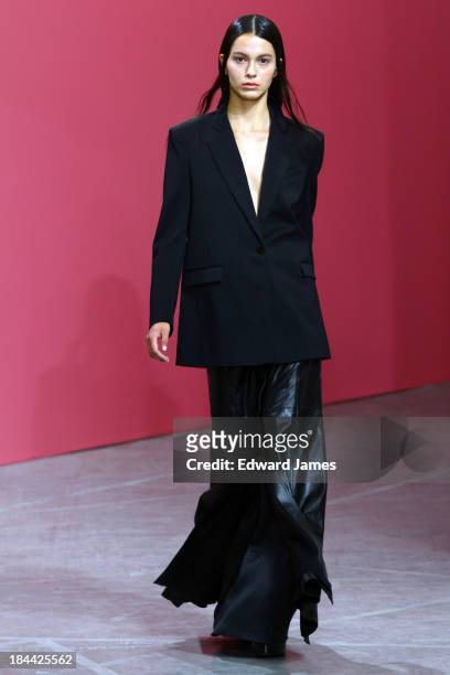 Model walks the runway at the Theyskens' Theory fashion show during Mercedes-Benz Fashion Week Spring 2014 on September 9, 2013 in New York City.