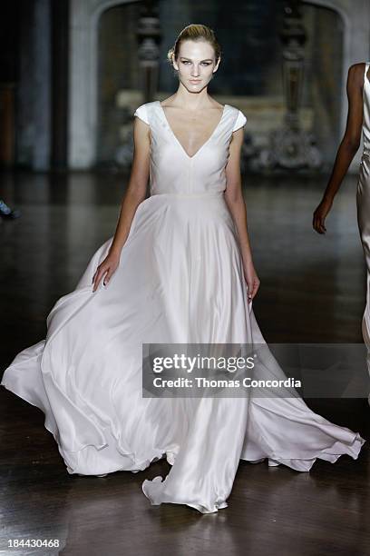 Model walks the runway at the Johanna Johnson Fall 2014 Bridal collection show on October 13, 2013 in New York City.