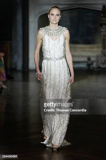 Model walks the runway at the Johanna Johnson Fall 2014 Bridal collection show on October 13, 2013 in New York City.