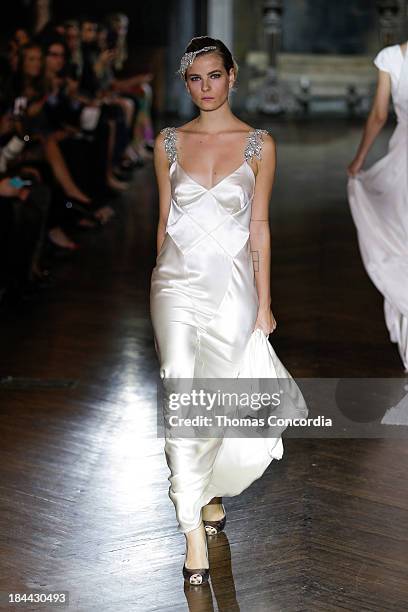 Model walks the runway at the Johanna Johnson Fall 2014 Bridal collection show on October 13, 2013 in New York City.