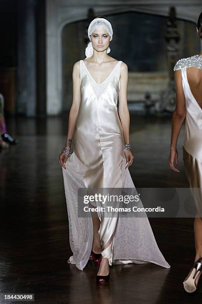 Model walks the runway at the Johanna Johnson Fall 2014 Bridal collection show on October 13, 2013 in New York City.