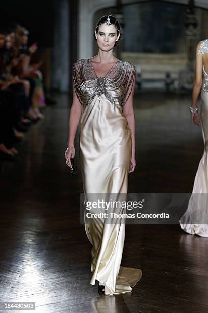 Model walks the runway at the Johanna Johnson Fall 2014 Bridal collection show on October 13, 2013 in New York City.