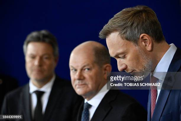German Minister of Economics and Climate Protection Robert Habeck, German Chancellor Olaf Scholz and Finance Minister Christian Lindner give a...