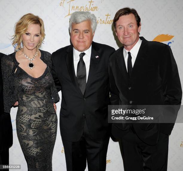 Actress Janet Jones Gretzky, Jay Leno and Wayne Gretzky attend the 10th Annual Alfred Mann Foundation Gala at 9900 Wilshire Blvd on October 13, 2013...