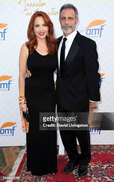 Actress Amy Yasbeck and attorney Michael Plonsker attend the 10th Annual Alfred Mann Foundation Gala in the Robinsons-May Lot on October 13, 2013 in...