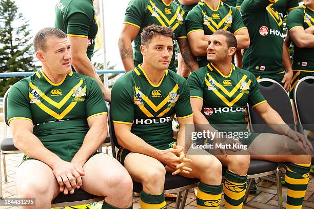 Paul Gallen, Cooper Cronk and Robbie Farah wait during an Australian Kangaroos Rugby League World Cup teamphoto session at Crowne Plaza, Coogee on...