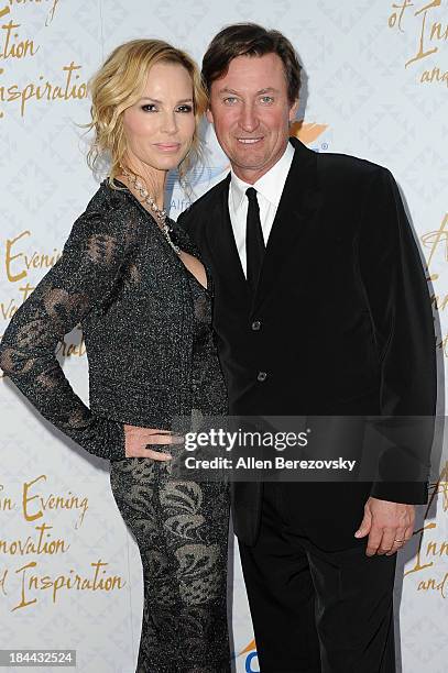 Hockey legend Wayne Gretzky and wife Janet Marie Gretzky attend the 10th annual Alfred Mann Foundation Gala at 9900 Wilshire Blvd on October 13, 2013...