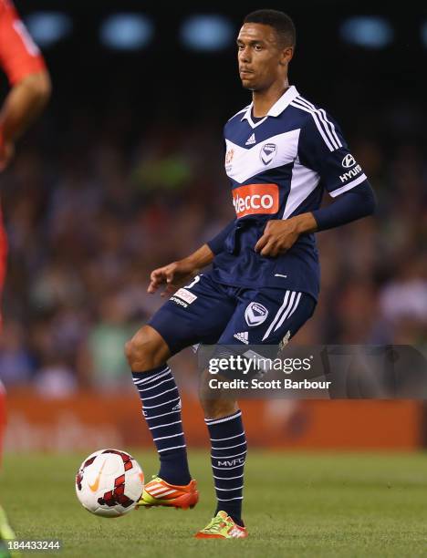 Rashid Mahazi of the Victory passes the ball during the round one A-League match between the Melbourne Victory and the Melbourne Heart at Etihad...