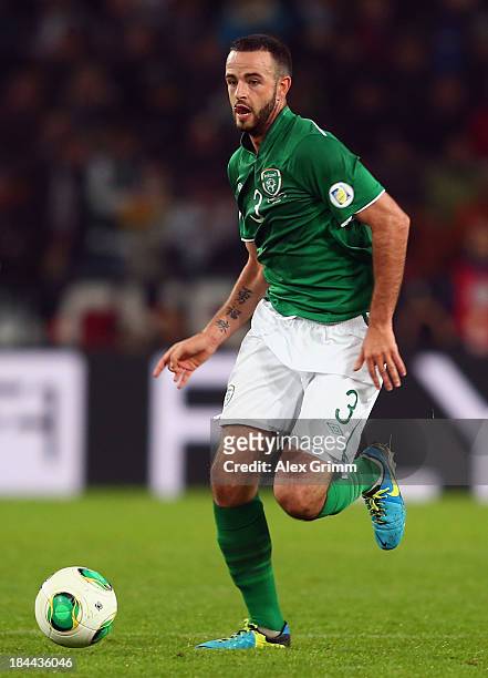 Marc Wilson of Ireland controles the ball during the FIFA 2014 World Cup Group C qualifiying match between Germany and Republic of Ireland at...
