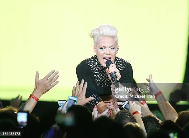 Pink performs onstage during her "The Truth About Love" tour held at Staples Center on October 13, 2013 in Los Angeles, California.