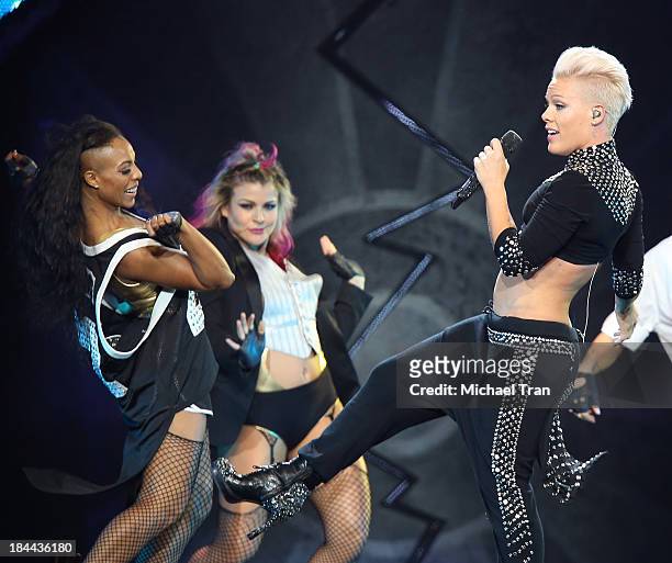 Pink performs onstage during her "The Truth About Love" tour held at Staples Center on October 13, 2013 in Los Angeles, California.
