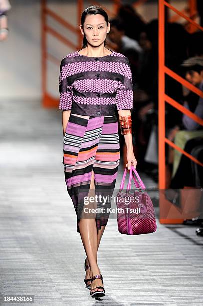 Model showcases designs on the runway during the Missoni show as part of Mercedes Benz Fashion Week Tokyo S/S 2014 at Hikarie Hall A of Shibuya...