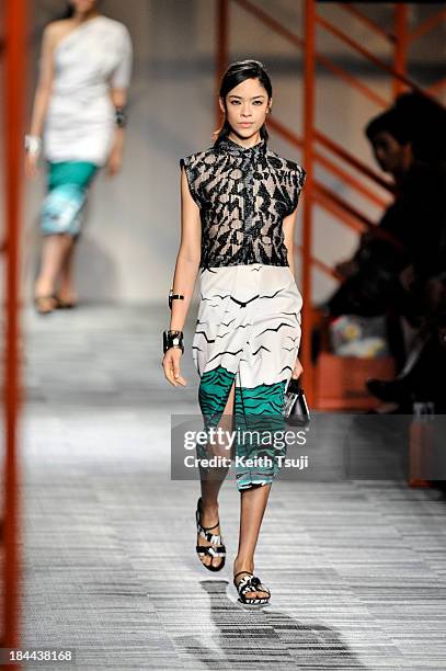 Model showcases designs on the runway during the Missoni show as part of Mercedes Benz Fashion Week Tokyo S/S 2014 at Hikarie Hall A of Shibuya...