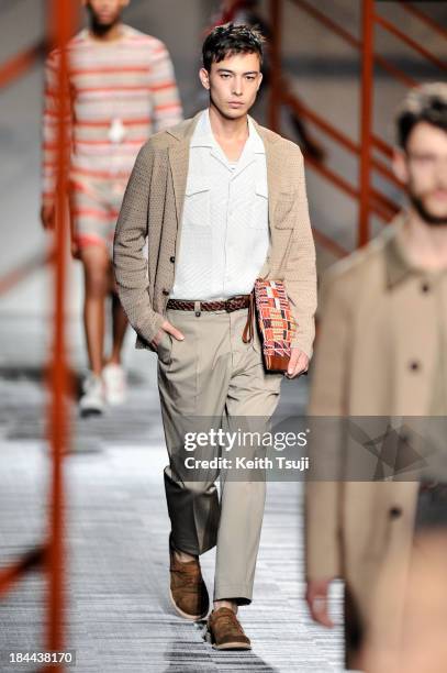 Model showcases designs on the runway during the Missoni show as part of Mercedes Benz Fashion Week Tokyo S/S 2014 at Hikarie Hall A of Shibuya...