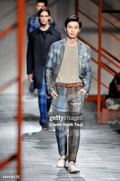 Model showcases designs on the runway during the Missoni show as part of Mercedes Benz Fashion Week Tokyo S/S 2014 at Hikarie Hall A of Shibuya...