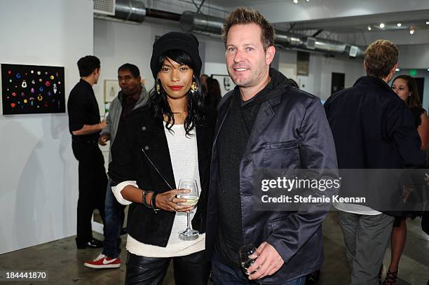 Amira Ahmed and Brian Oliver attend The Mistake Room's Benefit Auction on October 13, 2013 in Los Angeles, California.
