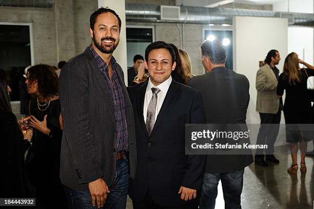 Justin Gilanyi and Cesar Garcia attend The Mistake Room's Benefit Auction on October 13, 2013 in Los Angeles, California.