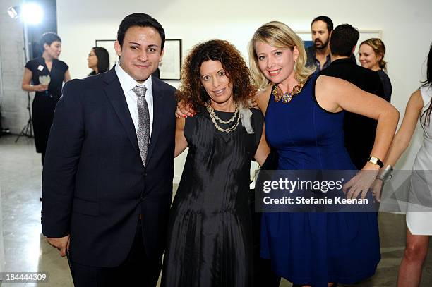 Cesar Garcia, Laurie Ziegler and Philad Knight attend The Mistake Room's Benefit Auction on October 13, 2013 in Los Angeles, California.