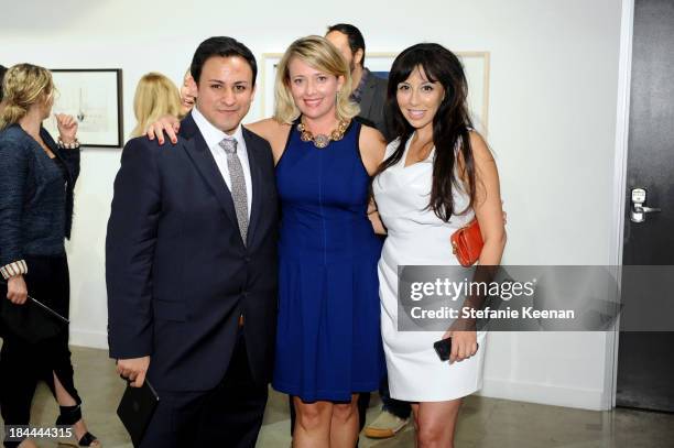 Cesar Garcia, Philad Knight and Veronica Fernandez attend The Mistake Room's Benefit Auction on October 13, 2013 in Los Angeles, California.