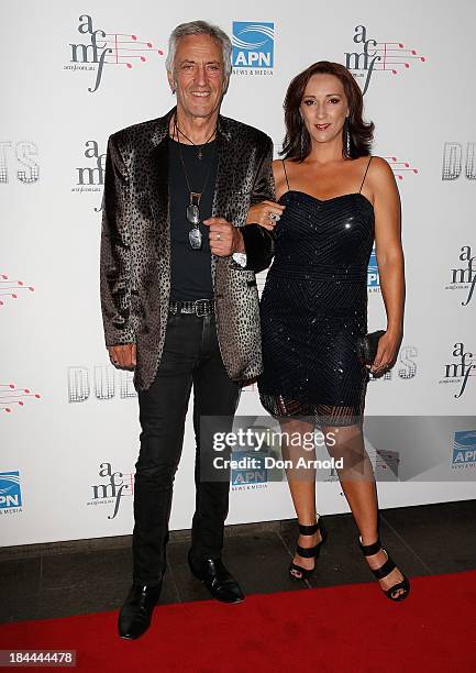 John Waters and Sheena Crouch pose at the 4th Annual Duets Gala concert at the Capitol Theatre on October 14, 2013 in Sydney, Australia.