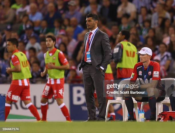 Heart Head Coach John Aloisi looks on during the round one A-League match between the Melbourne Victory and the Melbourne Heart at Etihad Stadium on...