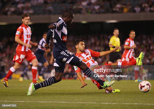 Jason Geria of the Victory shoots the ball during the round one A-League match between the Melbourne Victory and the Melbourne Heart at Etihad...