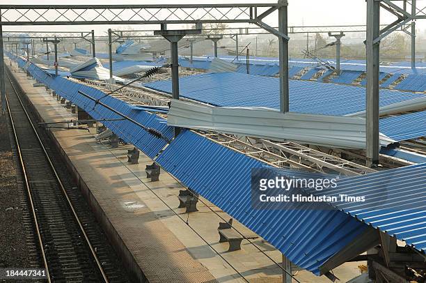 Destroyed railway station platform roof following strong winds that went upto a speed of 220 kmph during cyclone Phailin on October 14, 2013 in...