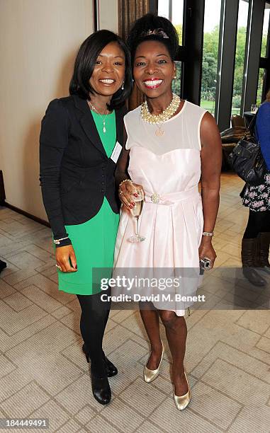 Ronke Phillips and Floella Benjamin attend the 58th Women of the Year lunch at the InterContinental Park Lane Hotel on October 14, 2013 in London,...