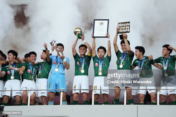 Players of Aomori Yamada celebrate with the trophy after the Prince Takamado Trophy JFA U-18 Football Premier League final between Aomori Yamada and...