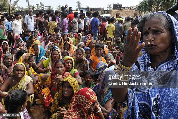 Villagers of Agasti Nuagaon of Ganjam District block the convoy of Odisha Chief Minister Naveen Patnaik during his visit to Phailin affected Ganjam...
