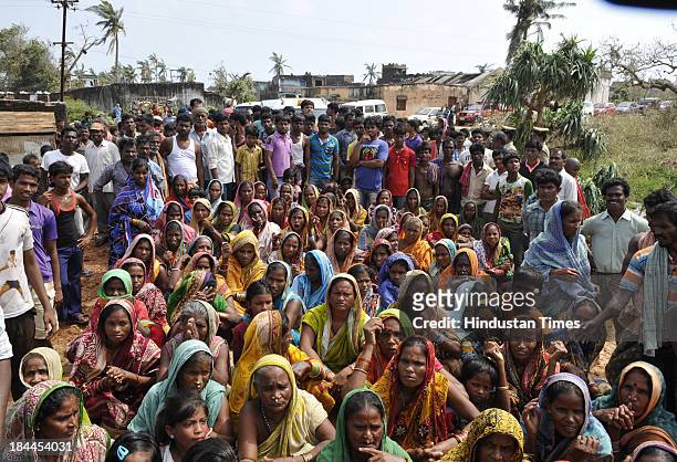 Villagers of Agasti Nuagaon of Ganjam District block the convoy of Odisha Chief Minister Naveen Patnaik during his visit to Phailin affected Ganjam...