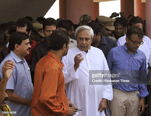 Odisha Chief Minister Naveen Patnaik talking with the journalist during visit to meet victim villagers at the multipurpose cylone shelter at...