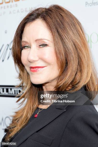 Mary McDonnell attends the Greg Lavoi spring 2014 runway presentation at Kyoto Gardens on October 13, 2013 in Los Angeles, California.