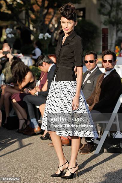 Model walks the runway during the Greg Lavoi spring 2014 runway presentation at Kyoto Gardens on October 13, 2013 in Los Angeles, California.