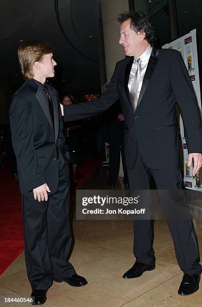 Haley Joel Osment & Geoffrey Rush during Hollywood Awards Gala Ceremony - Red Carpet Arrivals at The Beverly Hilton in Beverly Hills, California,...