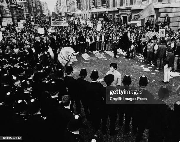 Mounted police officers before a police cordon during a demonstration outside the United States Embassy, in Grosvenor Square in the Mayfair area of...