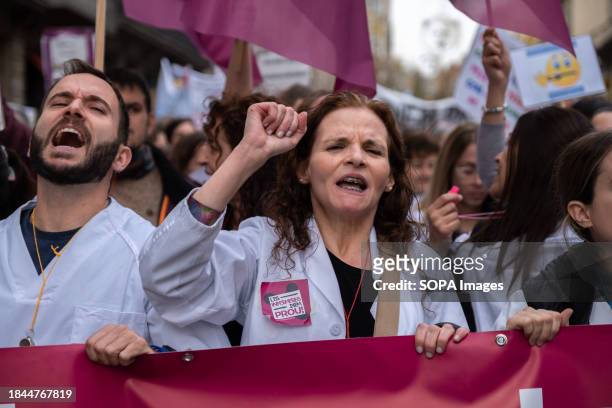 Public health service workers chant slogans during the demonstration. Called by a group of minority unions, thousands of nurses and administrative...