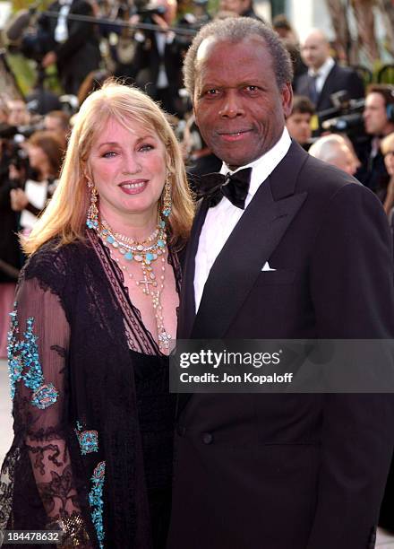 Sidney Poitier with wife Joanna Shimkus during 2004 Vanity Fair Oscar Party at Mortons in Beverly Hills, California, United States.
